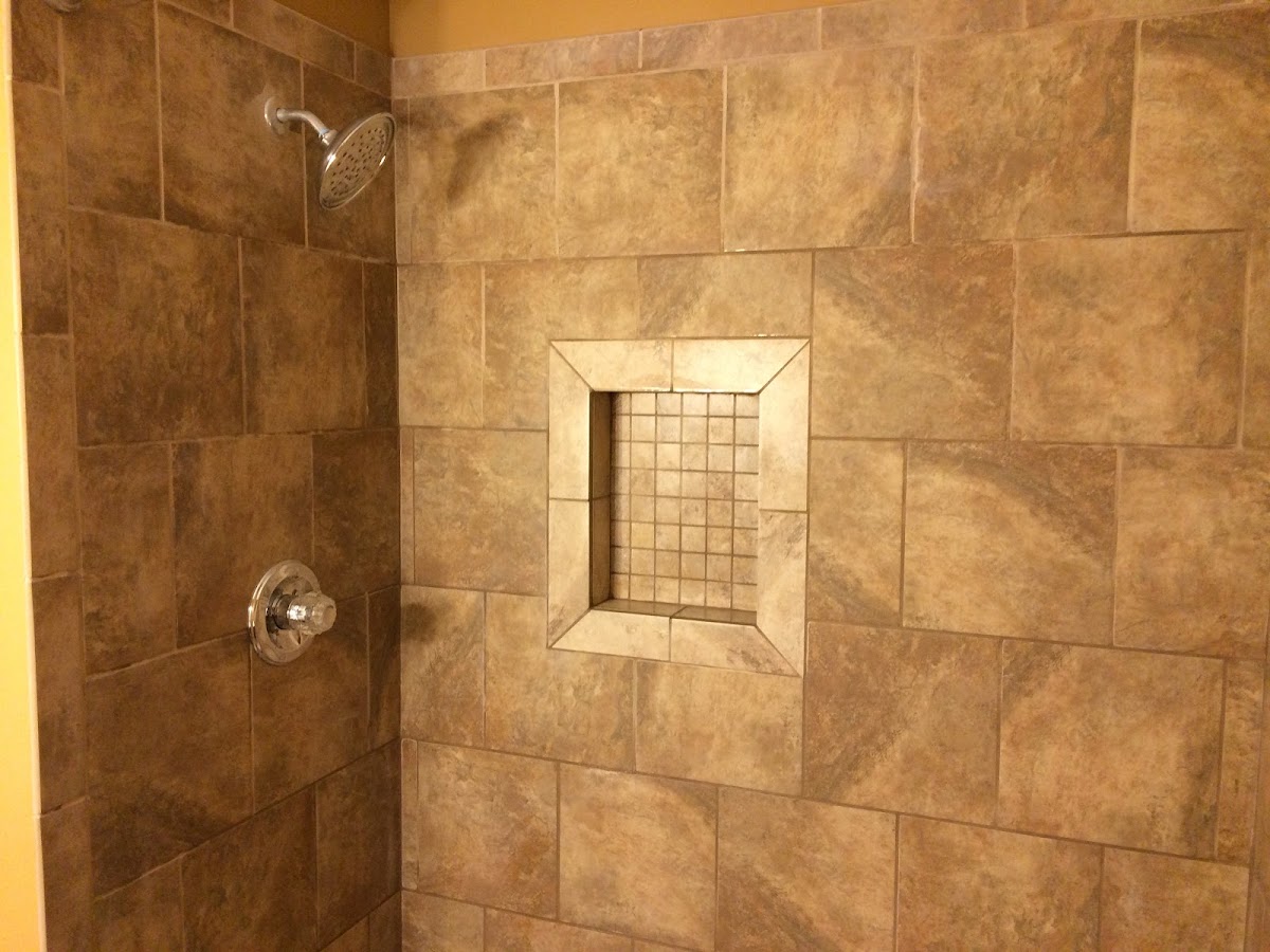 Tiled shower with a new valve and shower head